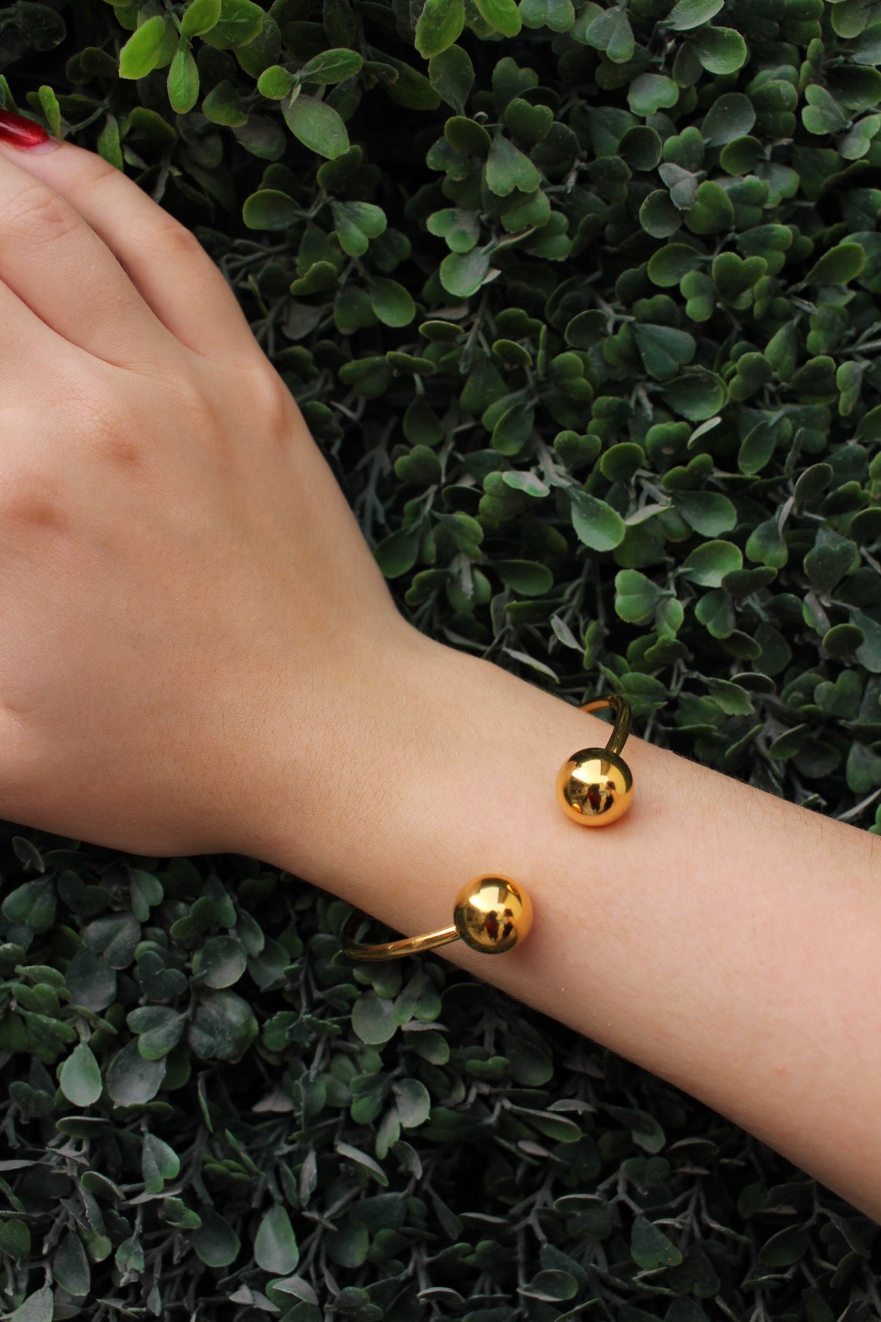 Brazalete Dorado con 2 Bolitas