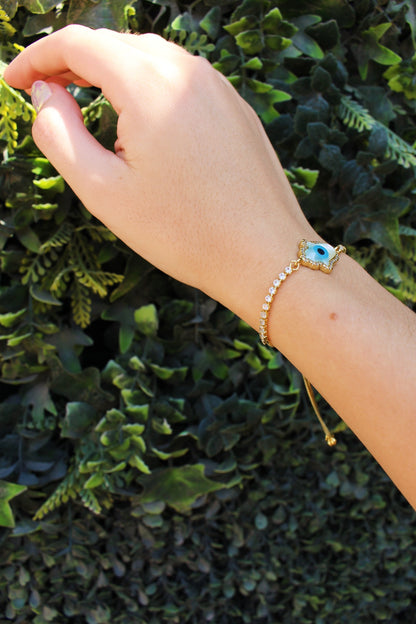 Pulsera Dorada Ojo y Mano Llena de Zirconias