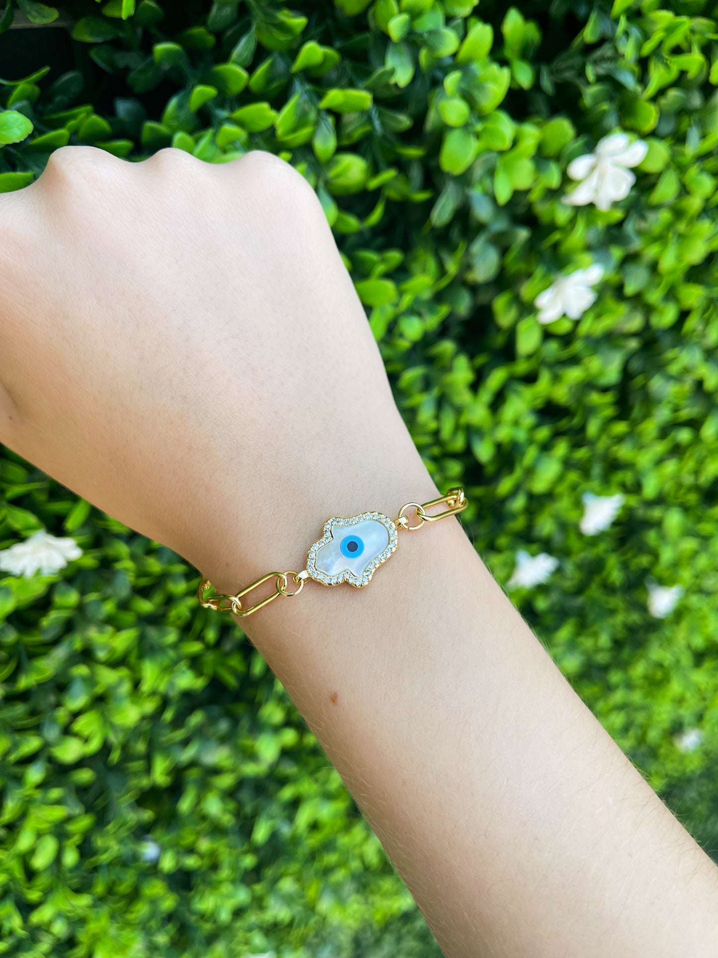 Pulsera Dorada Mano Ojo con Zirconias
